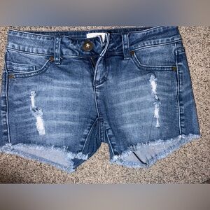 Super cute distressed / frayed medium wash jean shorts size 1 O’Neill EUC